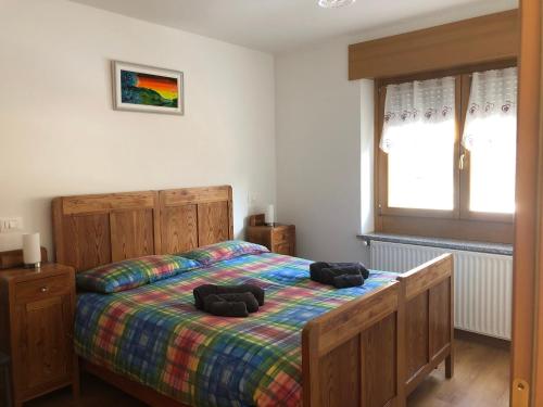 Postel nebo postele na pokoji v ubytování Appartamento Elisa