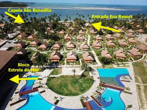 an aerial view of a resort with a map at Flat novo no Eco Resort in Tamandaré