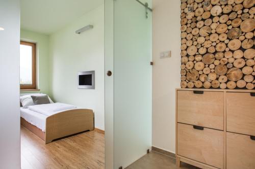 Posteľ alebo postele v izbe v ubytovaní Krupówki Loft