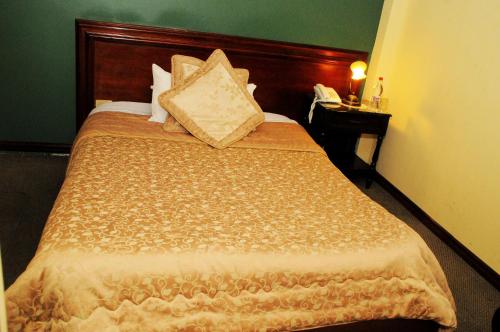 Colony Inn Hotelにあるベッド