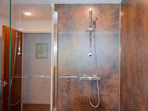 a shower with a glass door in a bathroom at Valley View in Hawley Bottom