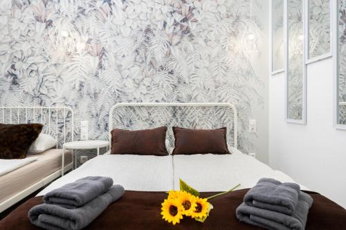 Posteľ alebo postele v izbe v ubytovaní Delta Apartments Budapest