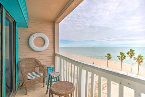 a balcony with chairs and a view of the beach at Oceanfront Corpus Christi Condo with Pool! in Corpus Christi