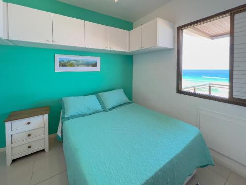 Postel nebo postele na pokoji v ubytování Apart Hotel Barra Leme com Vista Maravilhosa e 2 Qts B1-003