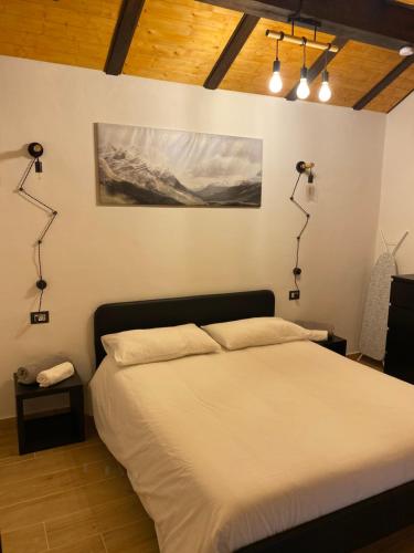 Postel nebo postele na pokoji v ubytování 21House - Appartamento 2