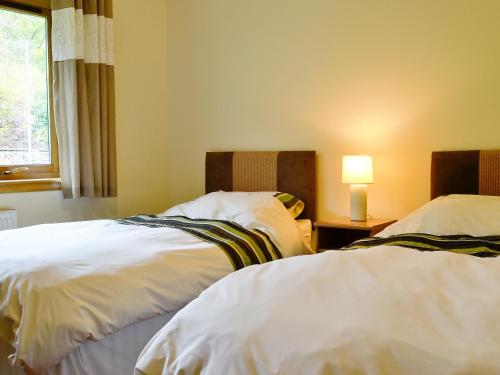 מיטה או מיטות בחדר ב-Blythswood
