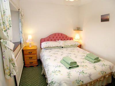 Ein Bett oder Betten in einem Zimmer der Unterkunft The Farm House
