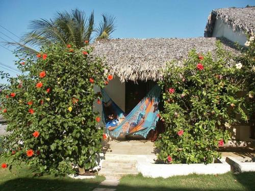 Un jardín fuera de Pousada Vale do Luar