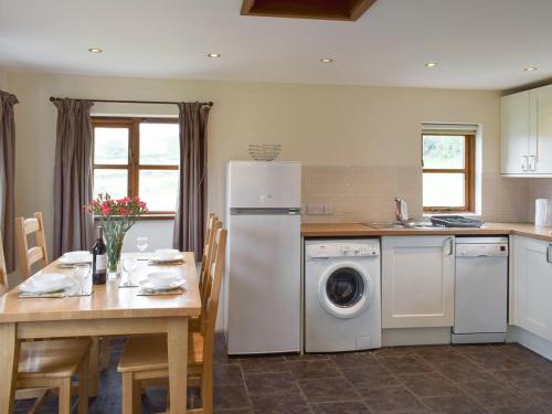 Kuchyň nebo kuchyňský kout v ubytování Bryncrwn Cottage