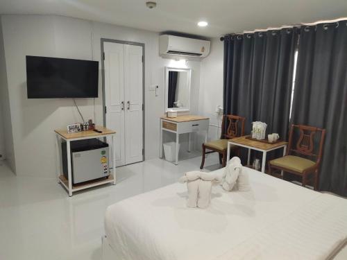 Cama o camas de una habitación en Regent Lodge Lampang