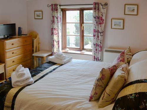 Krevet ili kreveti u jedinici u objektu Lanthorn Cottage