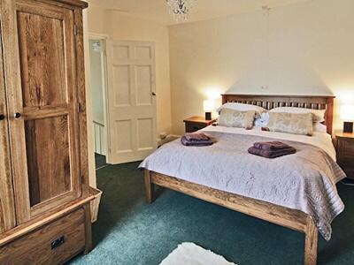 Ένα ή περισσότερα κρεβάτια σε δωμάτιο στο Glendower