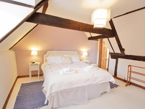 Postel nebo postele na pokoji v ubytování Fishermans Cottage