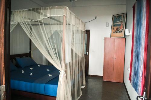 Een bed of bedden in een kamer bij Dream Cabana