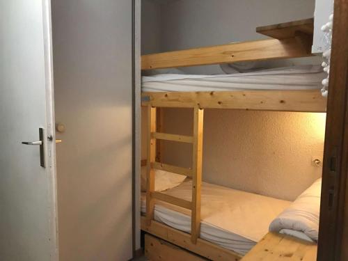a bunk room with two bunk beds in it at Appartement Arêches-Beaufort, 2 pièces, 5 personnes - FR-1-342-144 in Beaufort