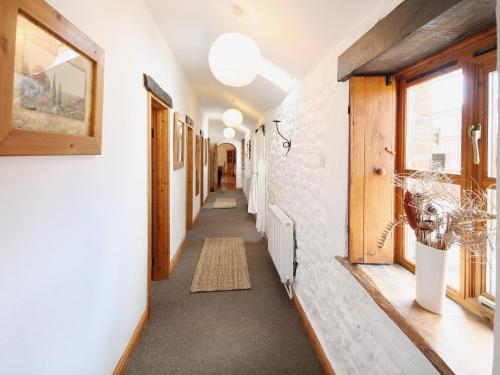 a corridor of a building with a hallway at The Willows in Parkmill