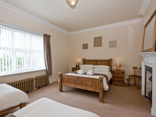 מיטה או מיטות בחדר ב-St Peters Court