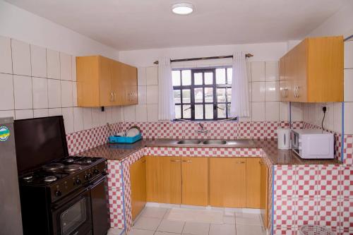 Kuchyň nebo kuchyňský kout v ubytování Hope Homestay