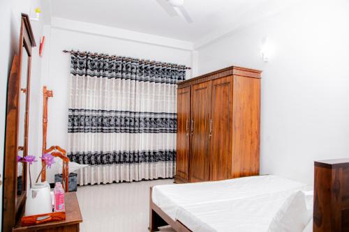 Ένα ή περισσότερα κρεβάτια σε δωμάτιο στο Villa 146 Dickwella