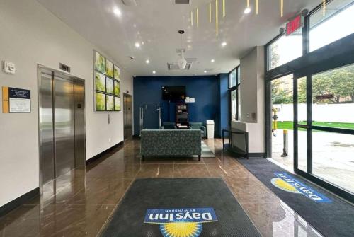 an office with a lobby with a sliding glass door at Days Inn by Wyndham Brooklyn Eastern Parkway in Brooklyn