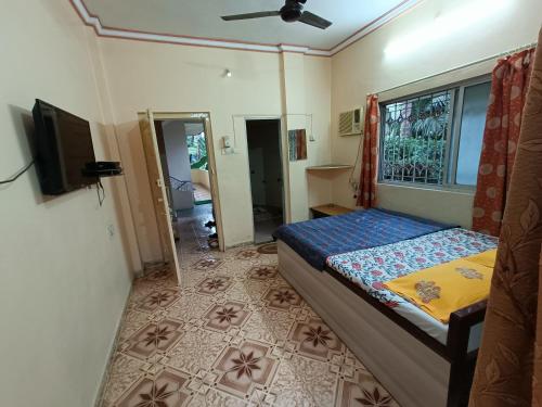 Cama o camas de una habitación en Sahil Residency