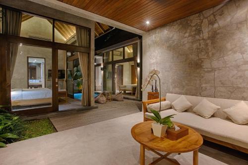 Uma área de estar em Taman Dharmawangsa Suites