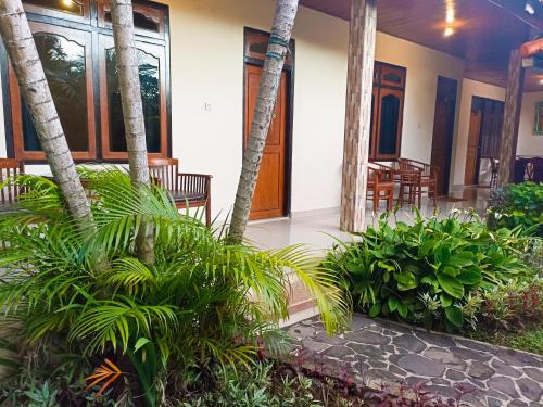 Κήπος έξω από το Kusnadi Hotel