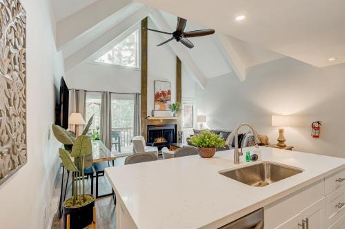 a kitchen with a sink and a ceiling fan at Crystal Bay Comfort in Incline Village
