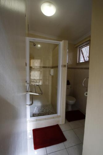 Ένα μπάνιο στο Bluewater Guesthouse