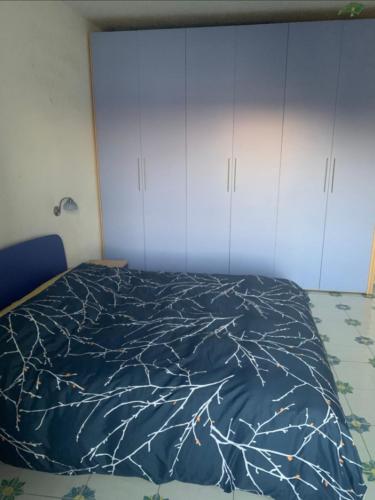 Katil atau katil-katil dalam bilik di La Stanza sul Porto