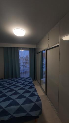 Posteľ alebo postele v izbe v ubytovaní Apartament Holiday 32