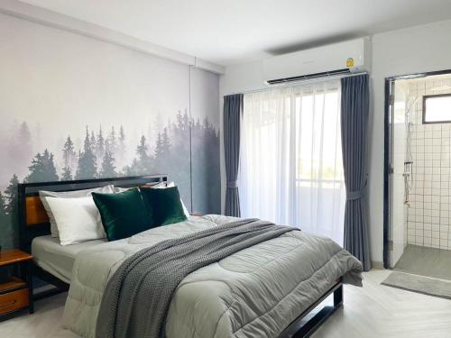 Postel nebo postele na pokoji v ubytování Misty forest by Bee