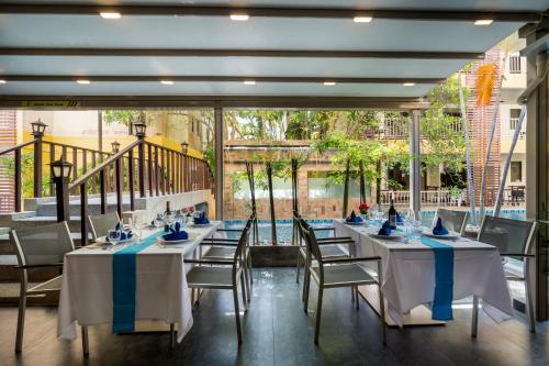 En restaurant eller et andet spisested på Tuana Hotels Casa Del Sol