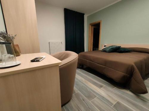 Ένα ή περισσότερα κρεβάτια σε δωμάτιο στο Limatola BnB