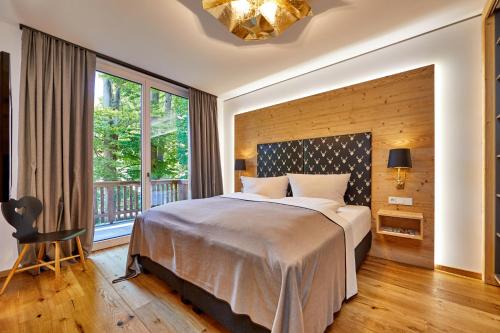 Ένα ή περισσότερα κρεβάτια σε δωμάτιο στο Parkchalet