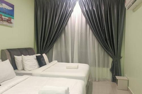 Katil atau katil-katil dalam bilik di Bali Residence by Beca inn , musliim only