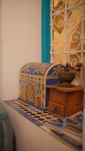 a colorful box sitting on top of a table at Riad Darna in Tetouan