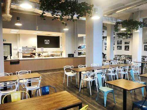Reštaurácia alebo iné gastronomické zariadenie v ubytovaní Apartimento Hydral Viene