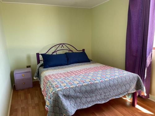 מיטה או מיטות בחדר ב-Casa Nueva Familiar