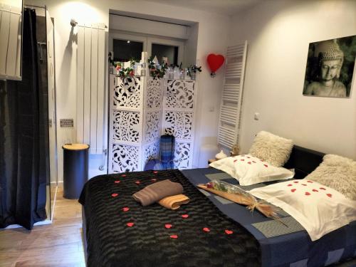 Postel nebo postele na pokoji v ubytování L’annexe sur mer