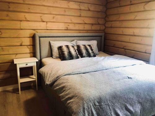 Ένα ή περισσότερα κρεβάτια σε δωμάτιο στο Large and luxurious family cabin in Myrkdalen