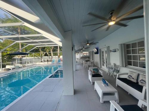 a swimming pool with a patio and a swimming pool at Home in Miami in Miami
