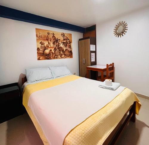 Cama o camas de una habitación en Ejecutivo Palace Sumak