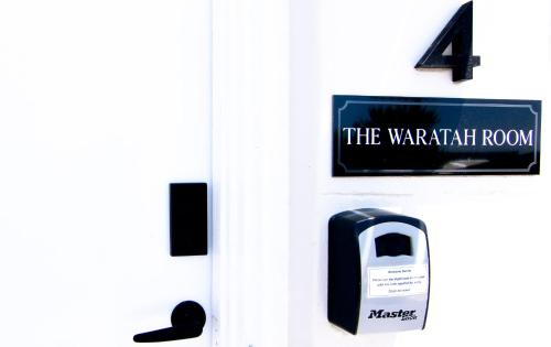 a door with a pay mail box on it at 70 On Mortimer in Mudgee