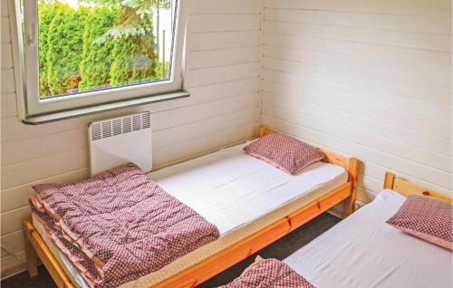 Ένα ή περισσότερα κρεβάτια σε δωμάτιο στο Beautiful Home In Mscice With Kitchen