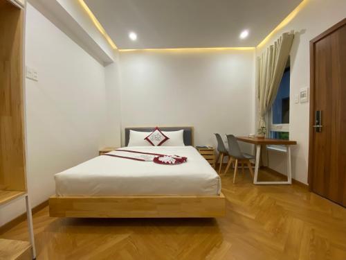 Postel nebo postele na pokoji v ubytování Feliz Dalat Homestay