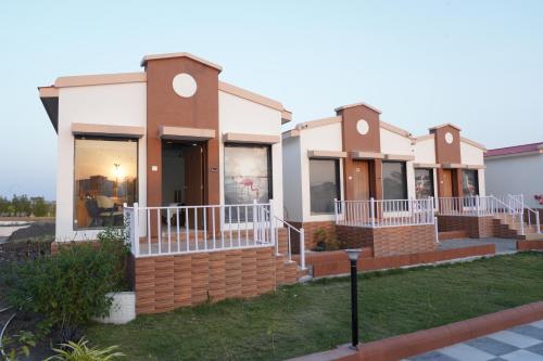 a row of houses on a street at Flamingo Club and Resort Una 3 Km Away from Diu Check Post in Diu