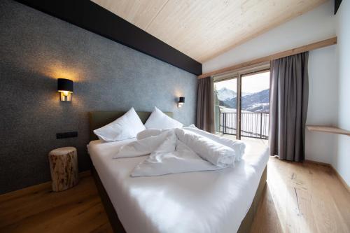 A bed or beds in a room at A CASA Granat