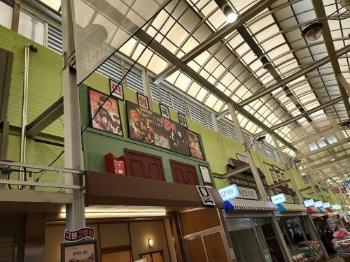 a large building with a ceiling and a shopping mall at Grandmother's Vegetable garden in Anseong