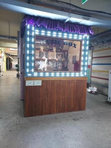 a restaurant with lights on top of a counter at Grandmother's Vegetable garden in Anseong
